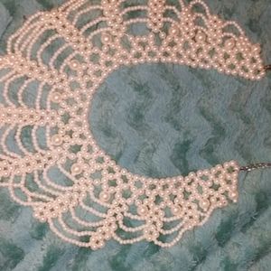 Fake pearl checker necklace